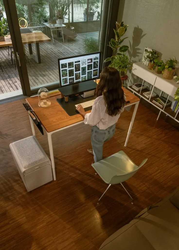 Height-adjustable desk with dual monitor setup