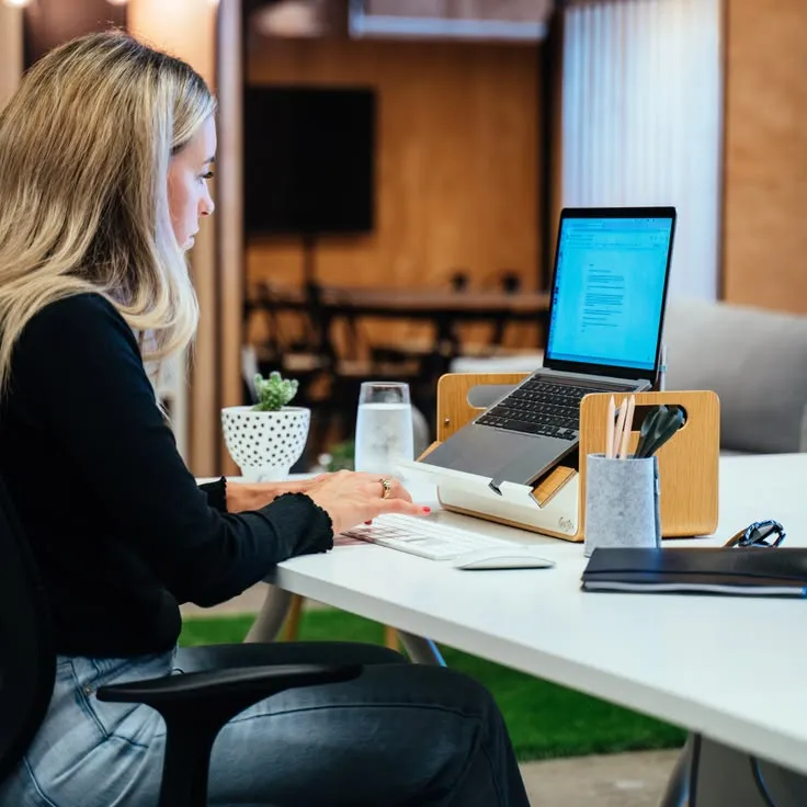 Comfortable seated posture at a properly adjusted desk